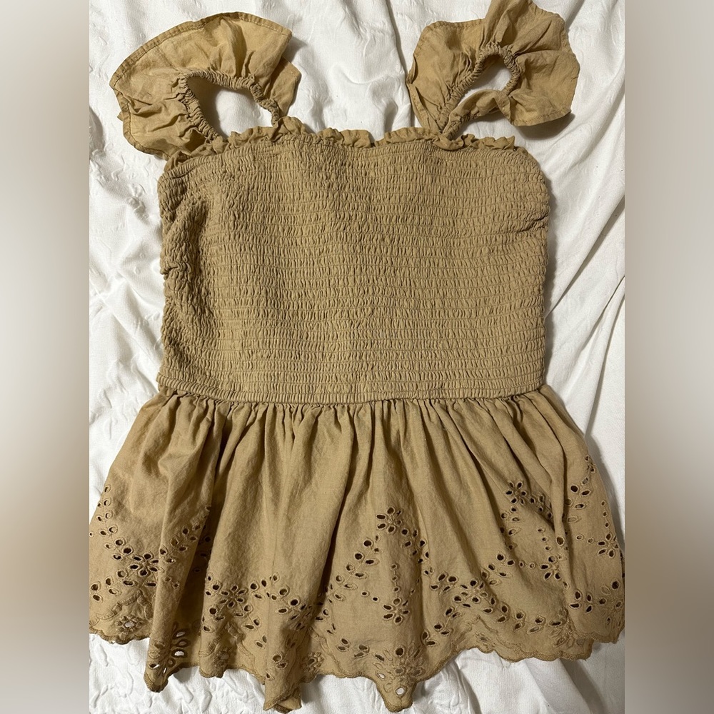 Stretchy Peplum Top with Eyelet Details